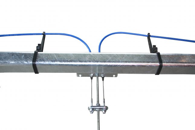 Cable pull holder for axle tube